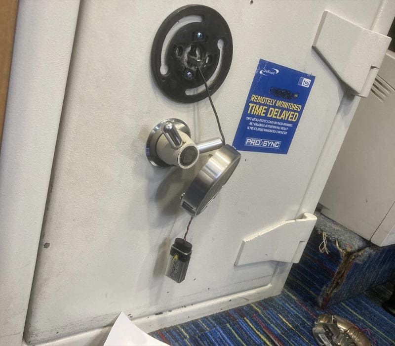 Safe engineer cracking a safe